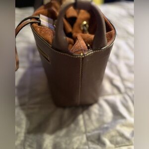 Dooney & Bourke | Bags | Dooney Bourke 975
Leather And Suede Bucket Style Purse